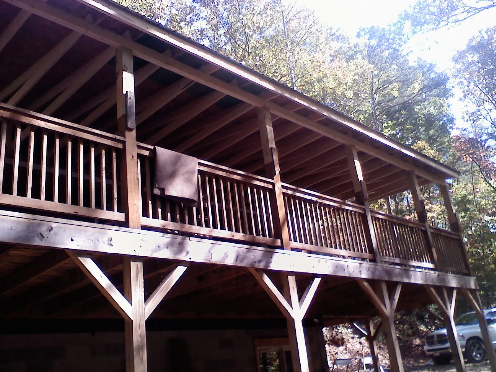 Timber framing under a new elevated porch and deck — Roof Leak Repair in Neal by Roofing Brothers